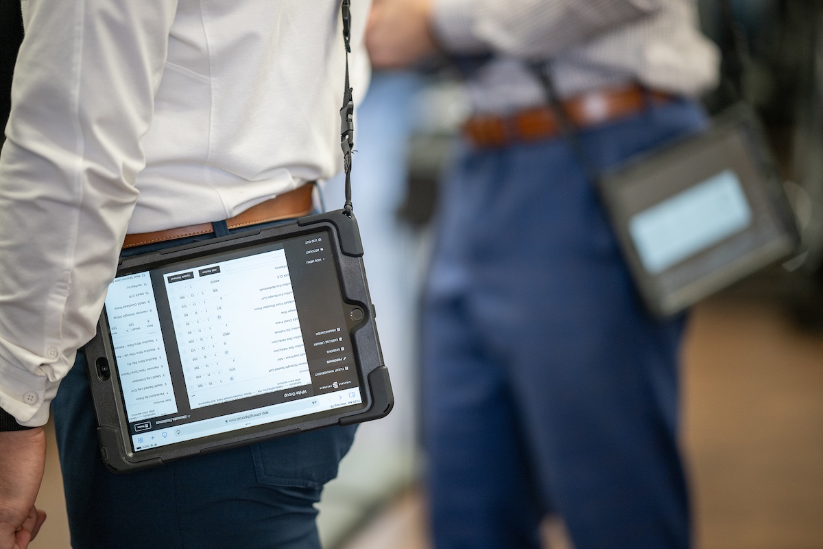 Personal trainers using StrengthPortal on iPads